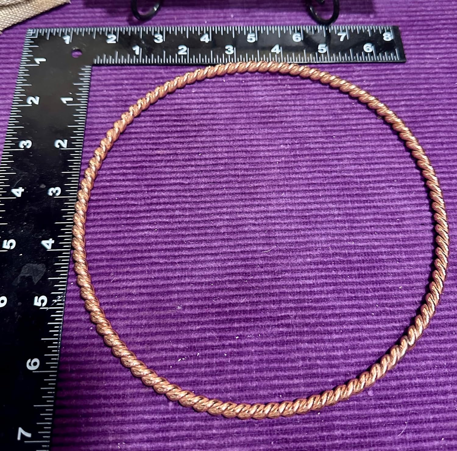 Twisted copper tensor ring for a smart meter